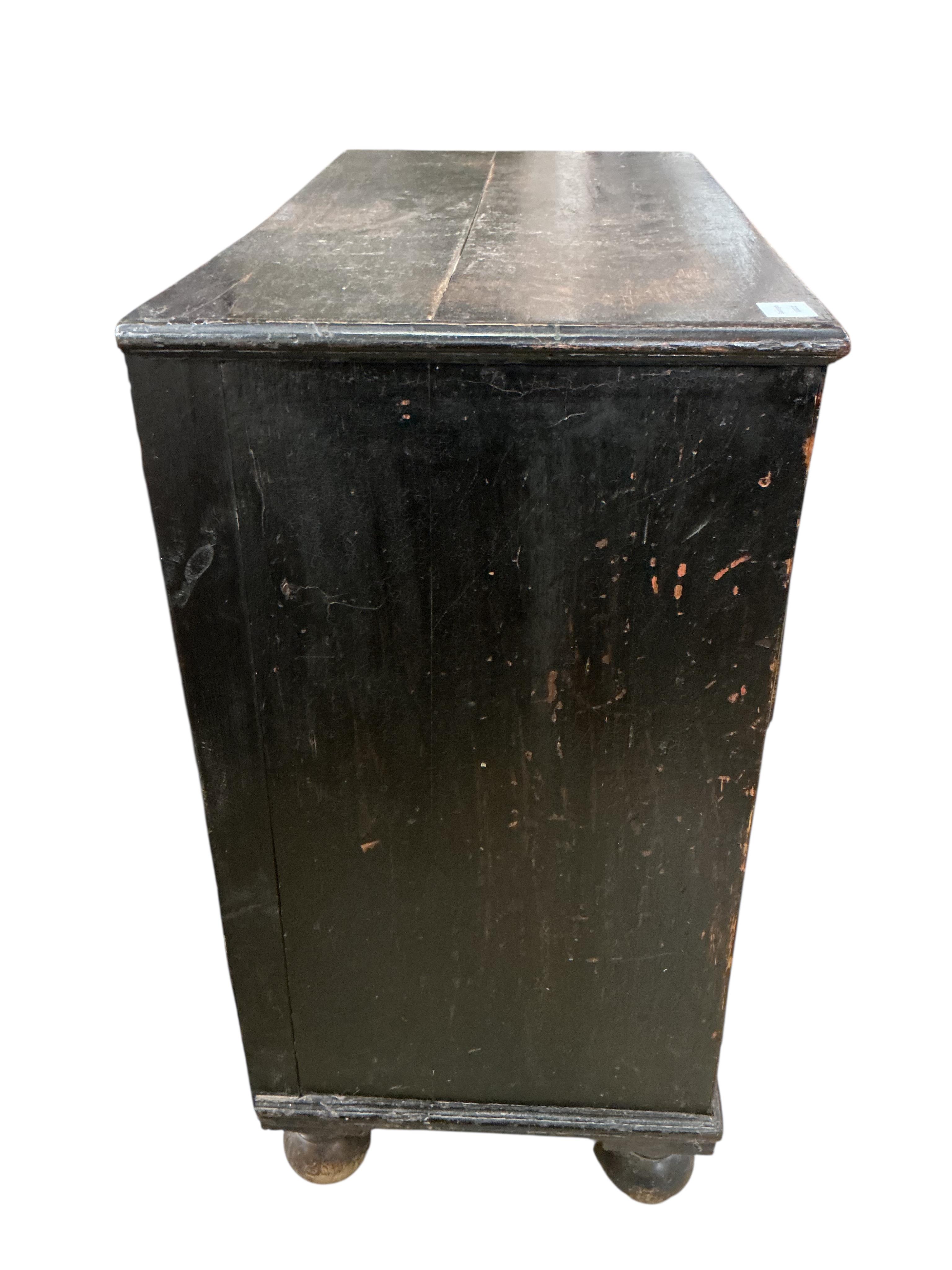 An 18th century oak chest, fitted with two short and three long drawers, later carved, width 89cm, depth 46cm, height 96cm